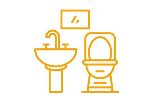 Waschbecken und Toilette mit Spiegel an der Wand.